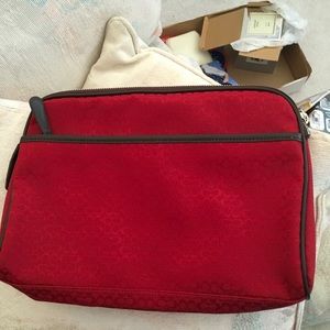 Coach  red carrying case